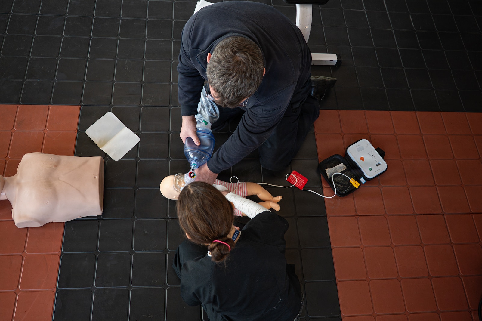 A photo of Sadie Shepard, a student at the Patricia A. Hanaford Career Center, performing CPR on a manikin during a SkillsUSA challenge at the Vermont Air National Guard base in South Burlington, VT, April 8, 2026.