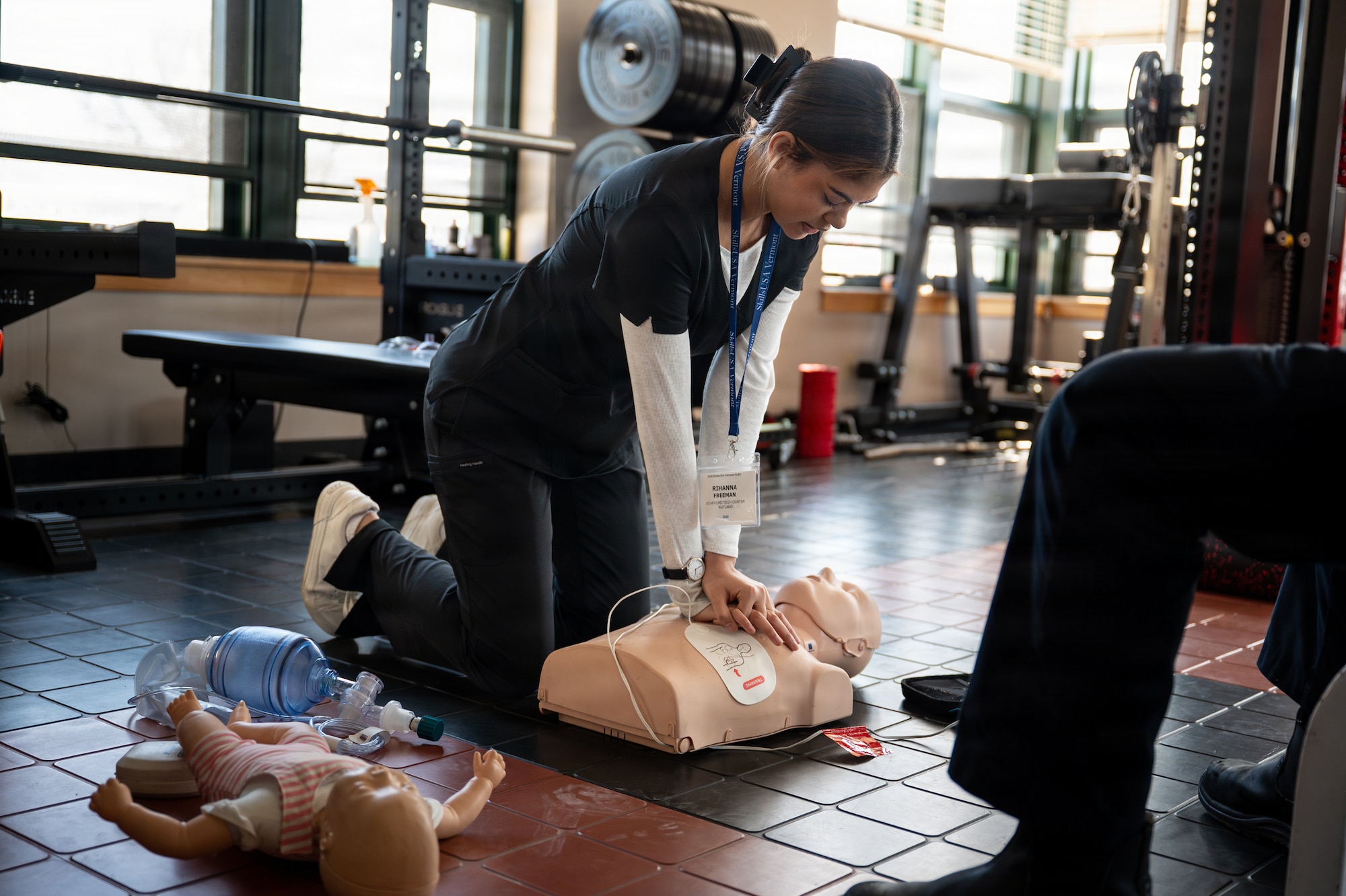 A photo of Rihanna Freeman, a student at the Stafford Medical Center, performing CPR on a manikin during a SkillsUSA competition at the Vermont Air National Guard base in South Burlington, VT, April 8, 2026.