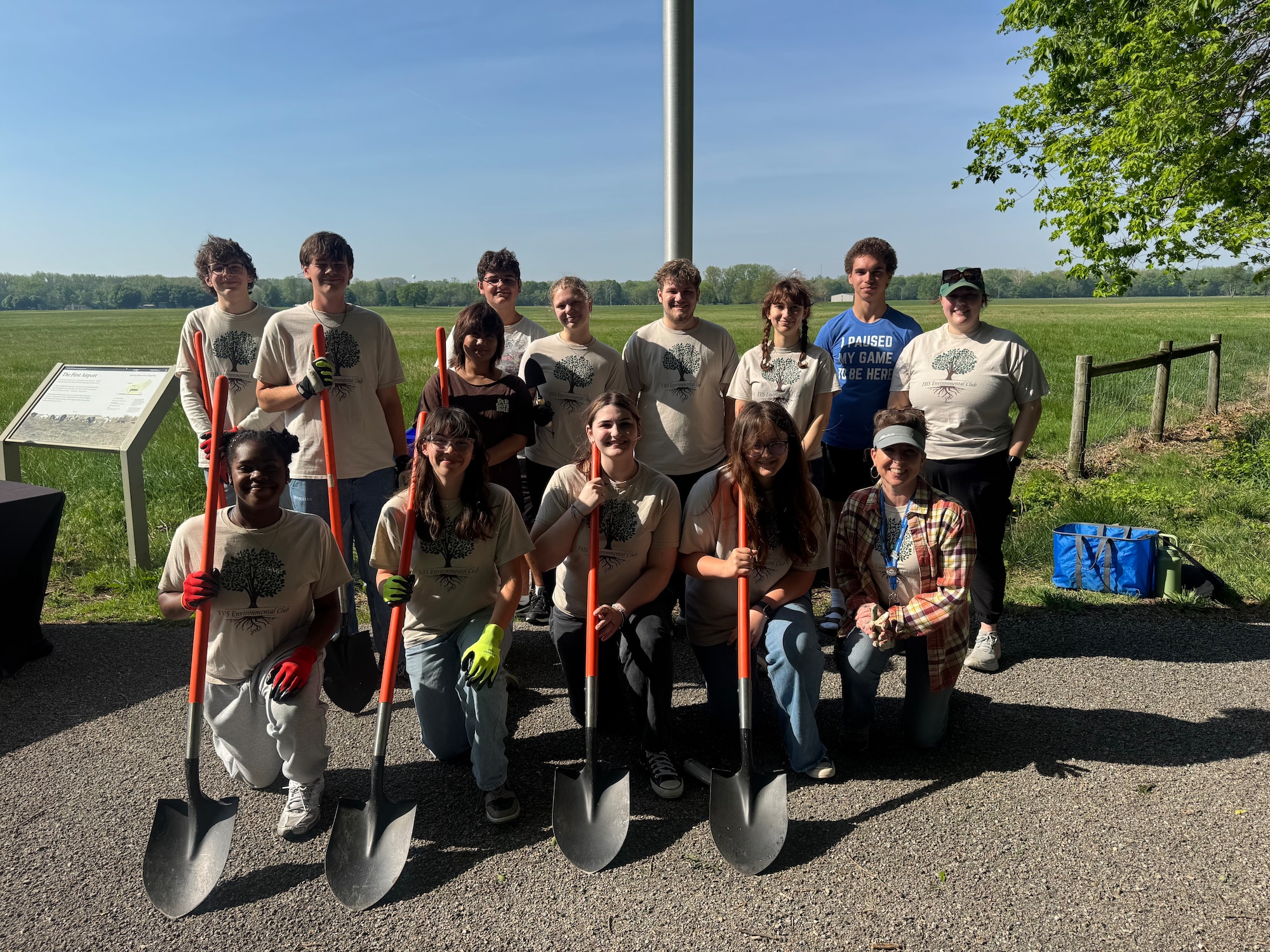 The Fairborn environmental club posed for a group photo at the Huffman Prairie Flying Field April 24, 2026, on Wright-Patterson Air Force Base.