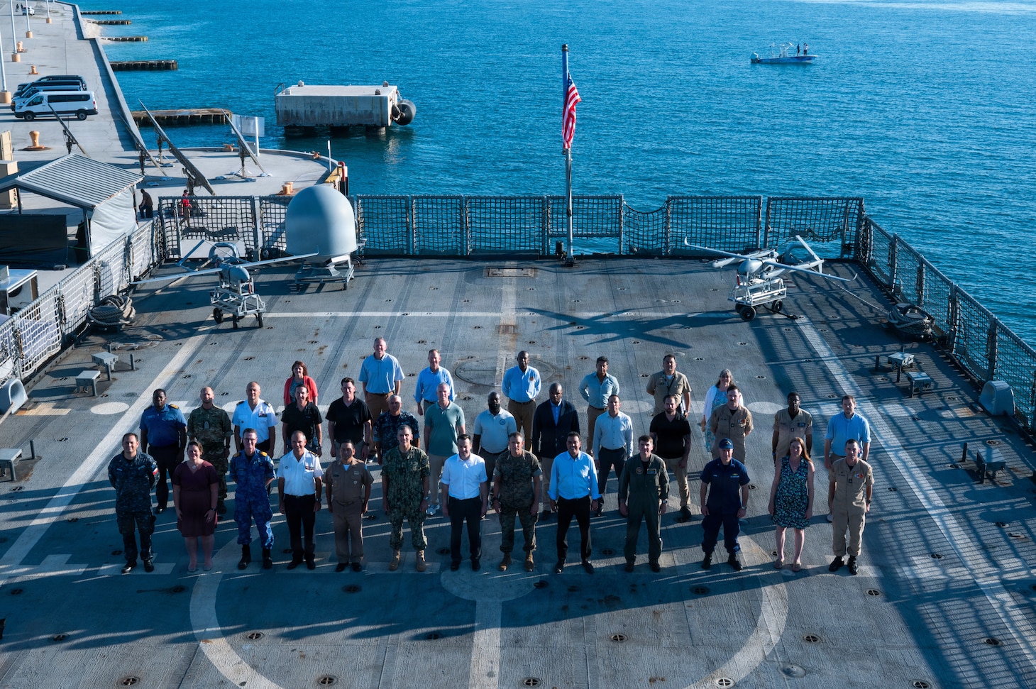 U.S. Marine Gen. Francis L. Donovan, commander of U.S. Southern Command and Rear Adm. Carlos Sardiello, commander of U.S. Naval Forces Southern Command/U.S. 4th Fleet, along with senior executive services representatives and partner nation officials stand for a group photo during FLEX 2026 on April 29, 2026.