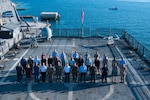 U.S. Marine Gen. Francis L. Donovan, commander of U.S. Southern Command and Rear Adm. Carlos Sardiello, commander of U.S. Naval Forces Southern Command/U.S. 4th Fleet, along with senior executive services representatives and partner nation officials stand for a group photo during FLEX 2026 on April 29, 2026.