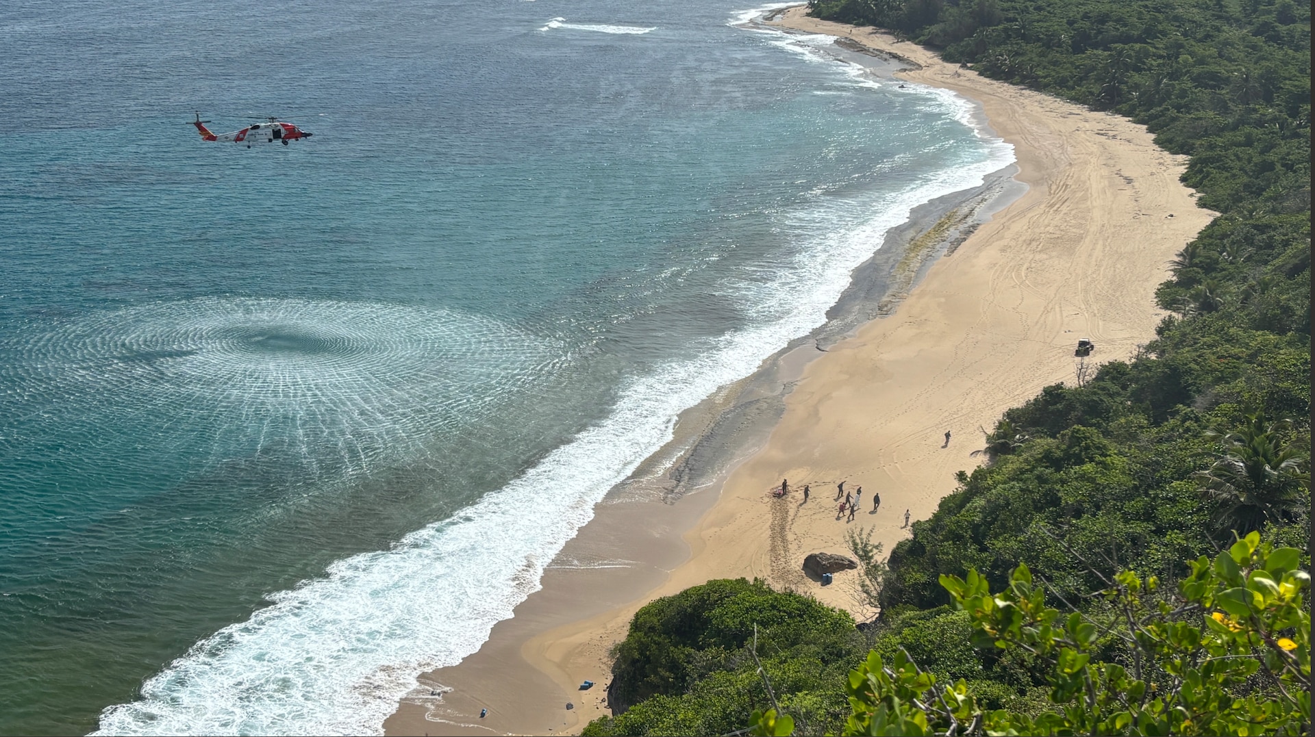 A Coast Guard MH-60T Jayhawk aircrew, U.S. Border Patrol, CG Base Borinquen personnel and local agency responders medevac five migrant aliens following an unlawful migration voyage vessel landing at Survival Beach in Aguadilla, Puerto Rico, April 29, 2026.
