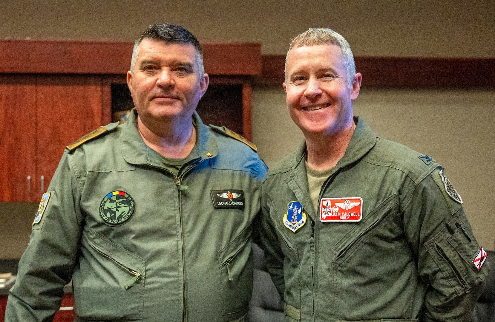 Romanian Air Force Commander Lt. Gen. Leonard Baraboi, left, and Col. John D. Caldwell, commander of the 187th Fighter Wing, Alabama Air National Guard, meet April 9, 2026, at Dannelly Field, Alabama.