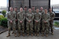 U.S. Soldiers with the Nebraska and North Dakota National Guards, assigned to Joint Task Force-District of Columbia in support of the DC Safe and Beautiful mission, pose for a group photo at a hotel in Alexandria, Virginia, April 28, 2026. About 2,500 National Guard members are supporting the mission, providing critical assistance to the Metropolitan Police Department to help ensure the safety of residents, commuters and visitors throughout the District.