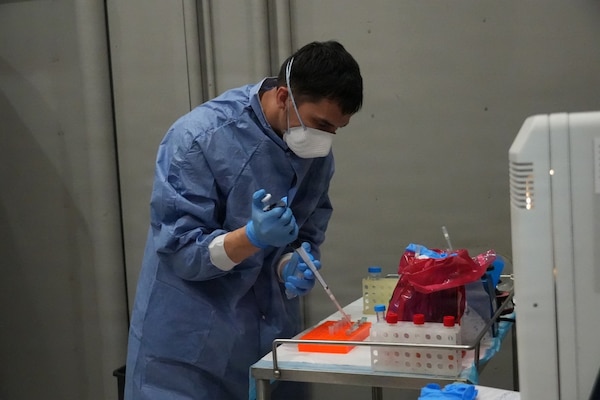A Sailor assigned to a Forward Deployable Preventive Medicine Unit (FDPMU) 5, San Diego, California, processes simulated patient samples during training at the Naval Expeditionary Medicine Warfighter Development Center, Camp Pendleton, California, March 17-26, 2026. FDPMUs support disease surveillance and force health protection in austere and operational environments. (U.S. Navy photo by Petty Officer 2nd Class Leandra Mojica)