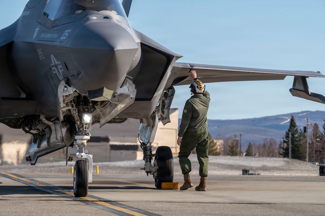 A U.S. Marine Corps maintainer performs preflight checks on an F-35B Lightning II during RED FLAG-Alaska 26-1 at Eielson Air Force Base, Alaska, April 27, 2026.