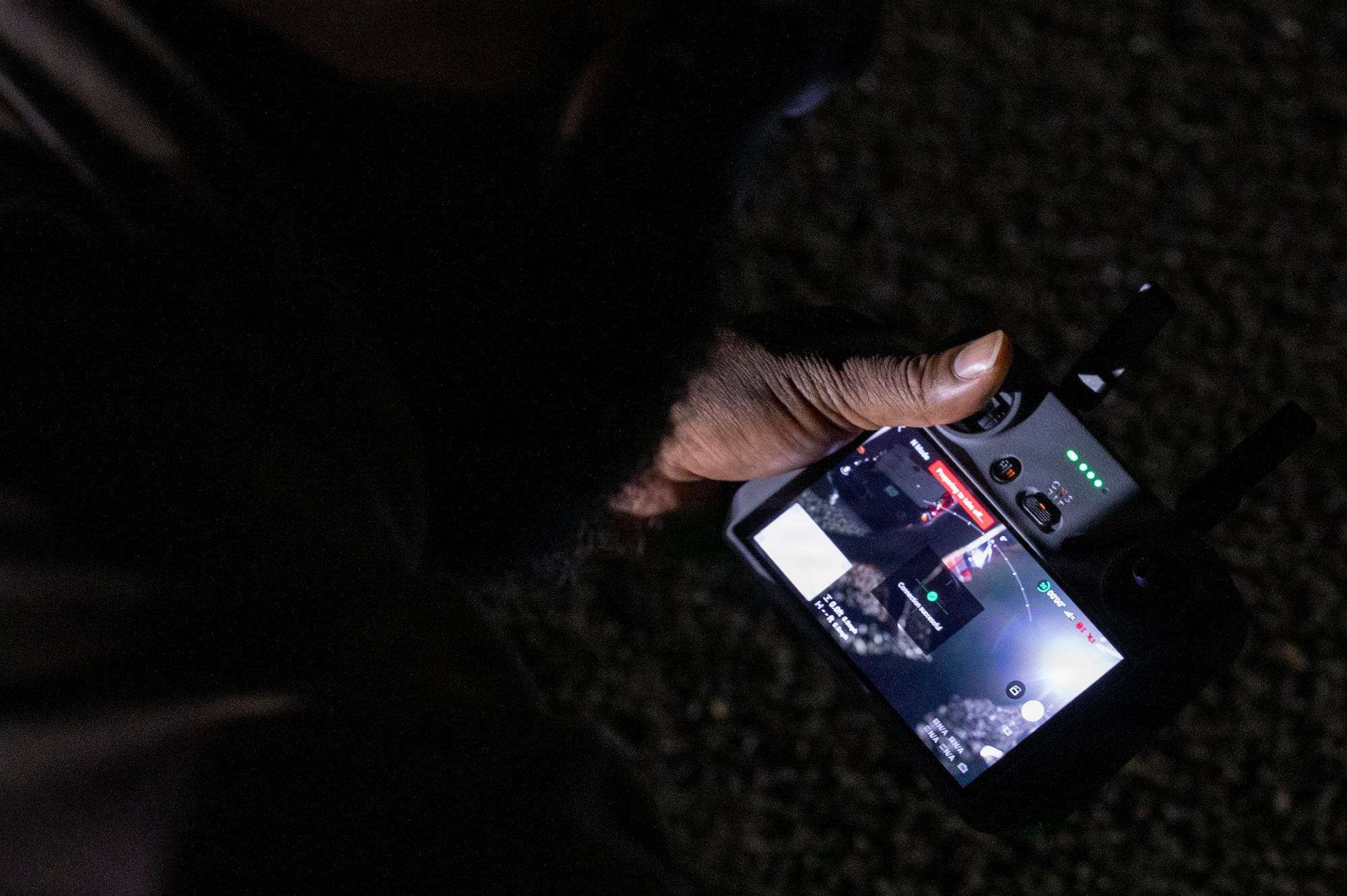 Technicians operating a drone