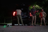 Technicians operating a drone