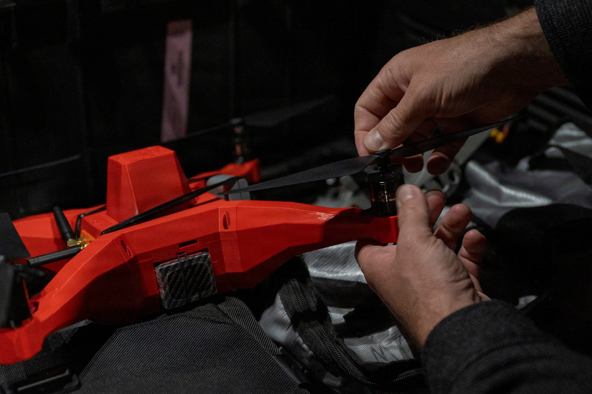 Technicians operating a drone