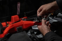 Technicians operating a drone