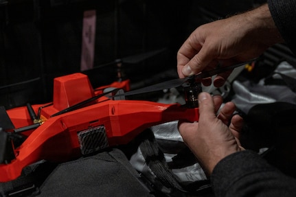 Technicians operating a drone