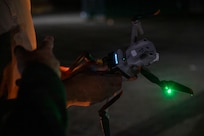 Technicians operating a drone