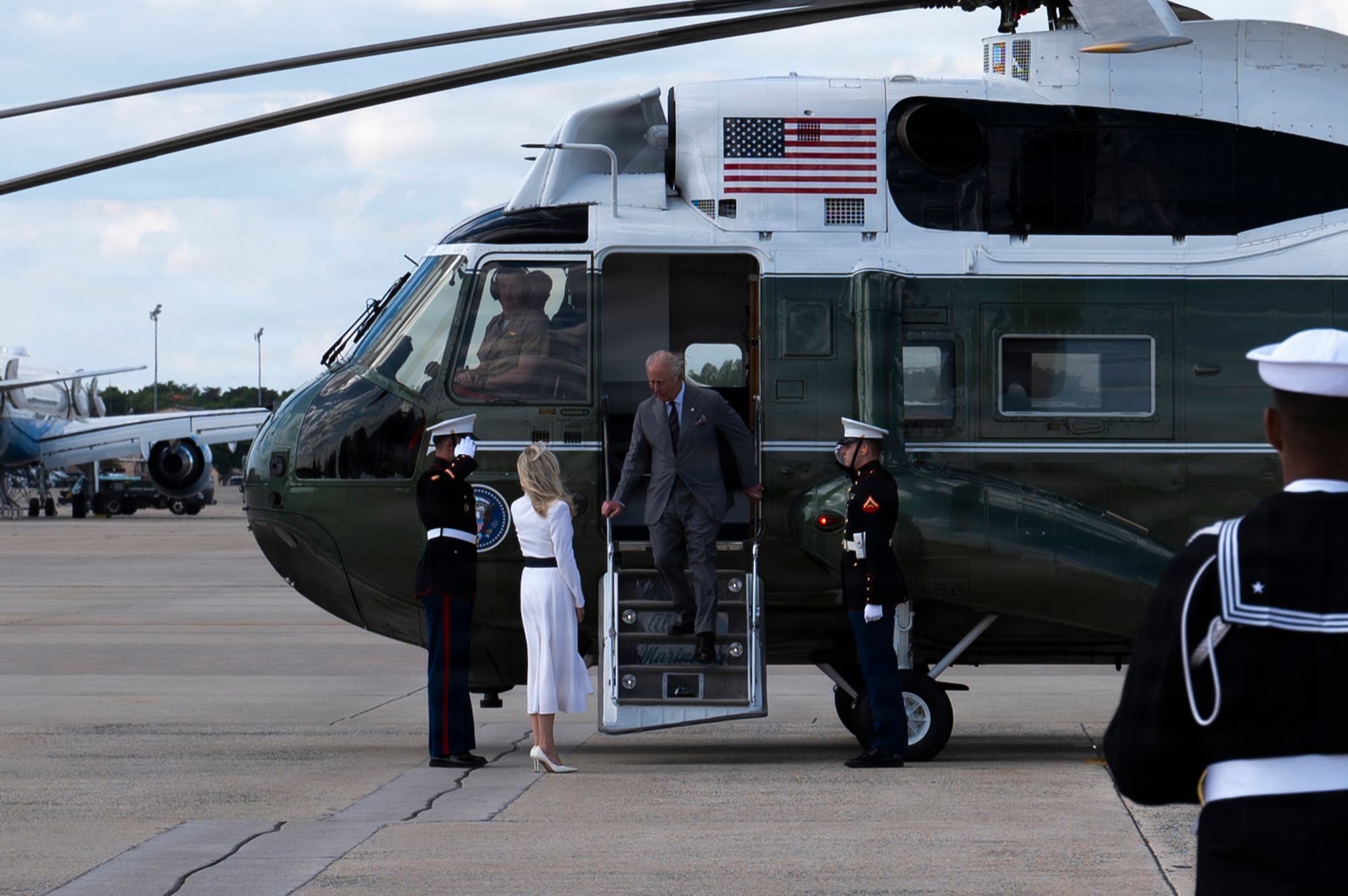 His Majesty of the United Kingdom of Great Britain and Northern Ireland, King Charles III, descends from a U.S. Marine Corps VH-3D Sea King helicopter and is greeted by Chief of Protocol of the United States Monica Crowley at Joint Base Andrews, Maryland, April 30, 2026. His Majesty arrived at the flight line for a military departure ceremony, marking the conclusion of the first royal state visit to the United States since his ascension to the throne. (U.S. Air Force photo by Staff Sgt. Alex Broome)