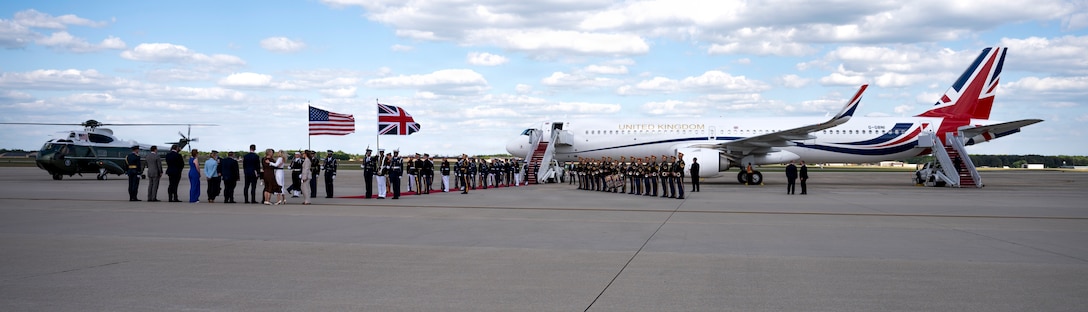 U.S. service members with an armed forces full honor cordon and Soldiers with the U.S. Army Band stand at attention next to a United Kingdom aircraft during a departure ceremony for His Majesty of the United Kingdom of Great Britain and Northern Ireland, King Charles III at Joint Base Andrews, Maryland, April 30, 2026. The ceremony marked the conclusion of the first royal state visit to the United States following His Majesty’s ascension to the throne. (U.S. Air Force photo by Staff Sgt. Alex Broome)