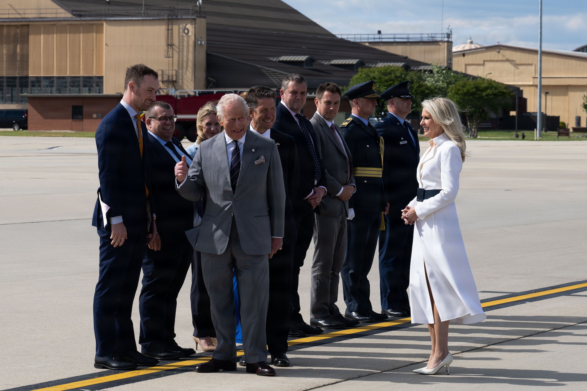His Majesty of the United Kingdom of Great Britain and Northern Ireland, King Charles III, left, greets Department of War leadership and U.S. service members at Joint Base Andrews, Maryland, April 30, 2026. The King met with the group prior to a military departure ceremony, marking the conclusion of the first royal state visit to the United States since his ascension to the throne. (U.S. Air Force photo by Airman 1st Class Mauricio Hidalgo)