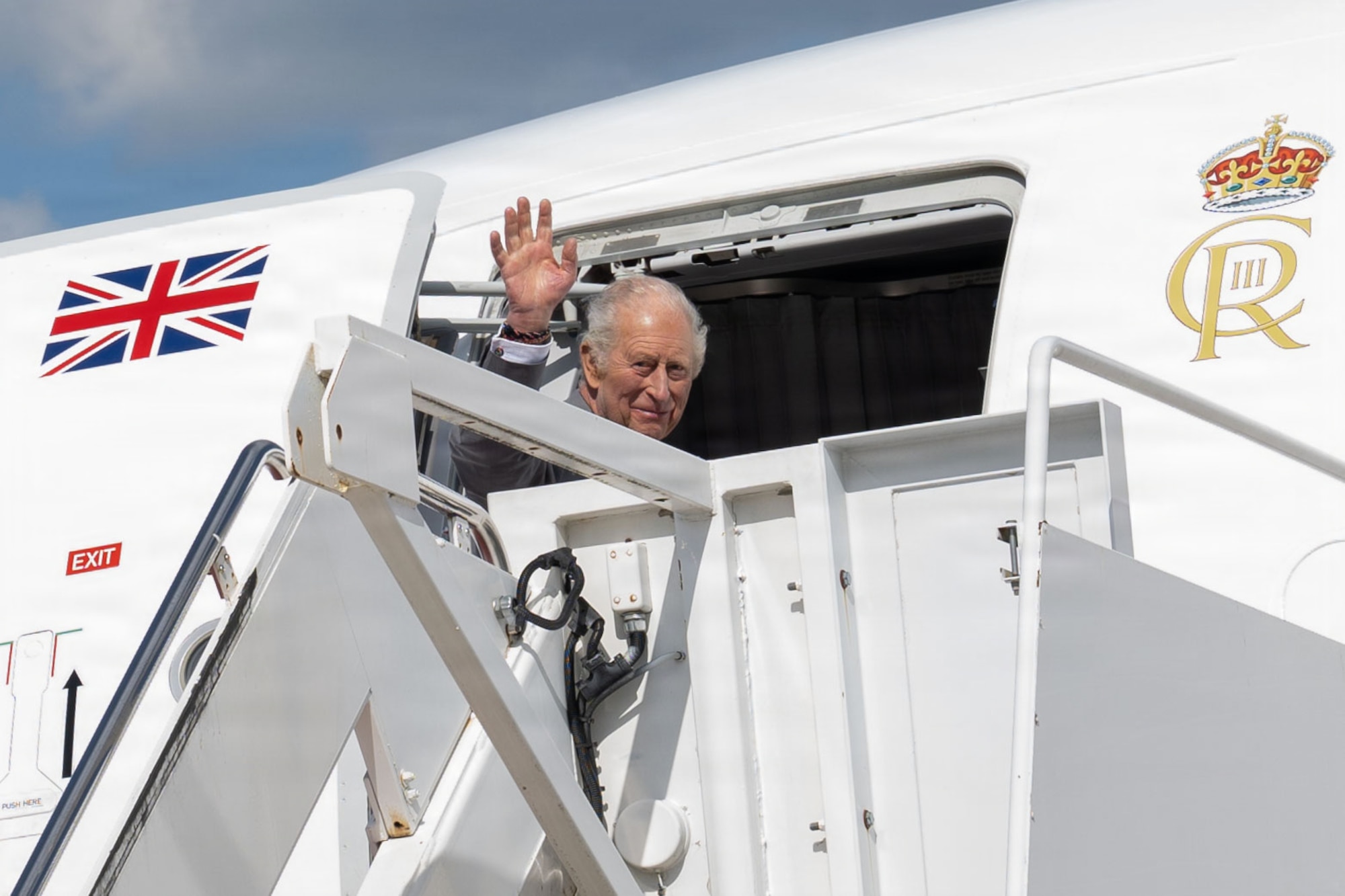 His Majesty of the United Kingdom of Great Britain and Northern Ireland, King Charles III, waves from a United Kingdom aircraft during a military departure ceremony at Joint Base Andrews, Maryland, April 30, 2026. The ceremony marked the conclusion of the first royal state visit to the United States following His Majesty’s ascension to the throne. (U.S. Air Force photo by Airman 1st Class Mauricio Hidalgo)