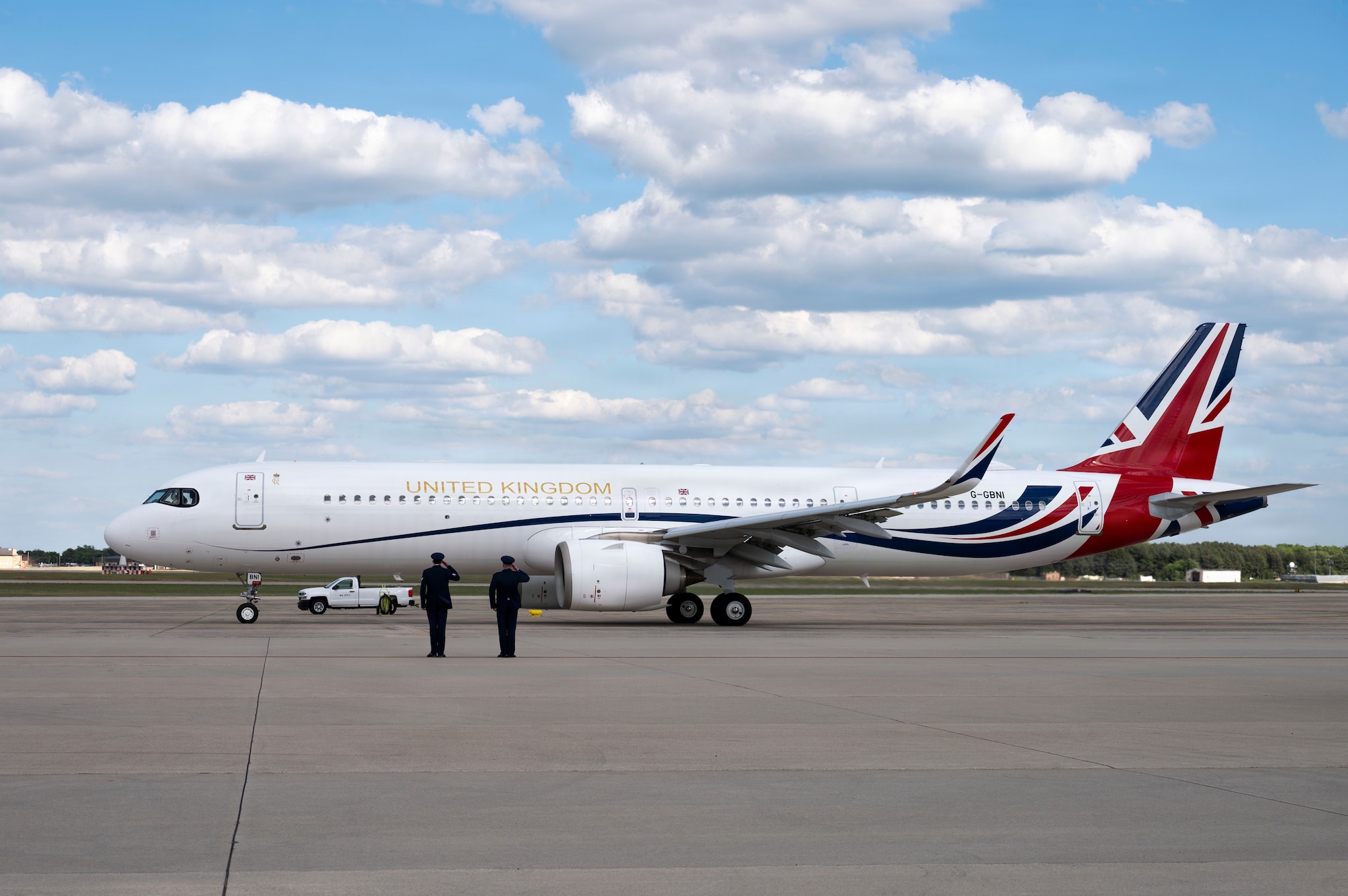 U.S. Air Force Col. Christopher M. Robinson, the commander of the 89th Airlift Wing, right, and Staff Sgt. Joseph Scaramuzzini, a special air missions passenger service agent assigned to the 89th Airlift Wing, salute a United Kingdom aircraft during a departure ceremony for His Majesty of the United Kingdom of Great Britain and Northern Ireland, King Charles III, at Joint Base Andrews, Maryland, April 30, 2026. The ceremony marked the conclusion of the first royal state visit to the United States following His Majesty’s ascension to the throne. (U.S. Air Force photo by Staff Sgt. Alex Broome)