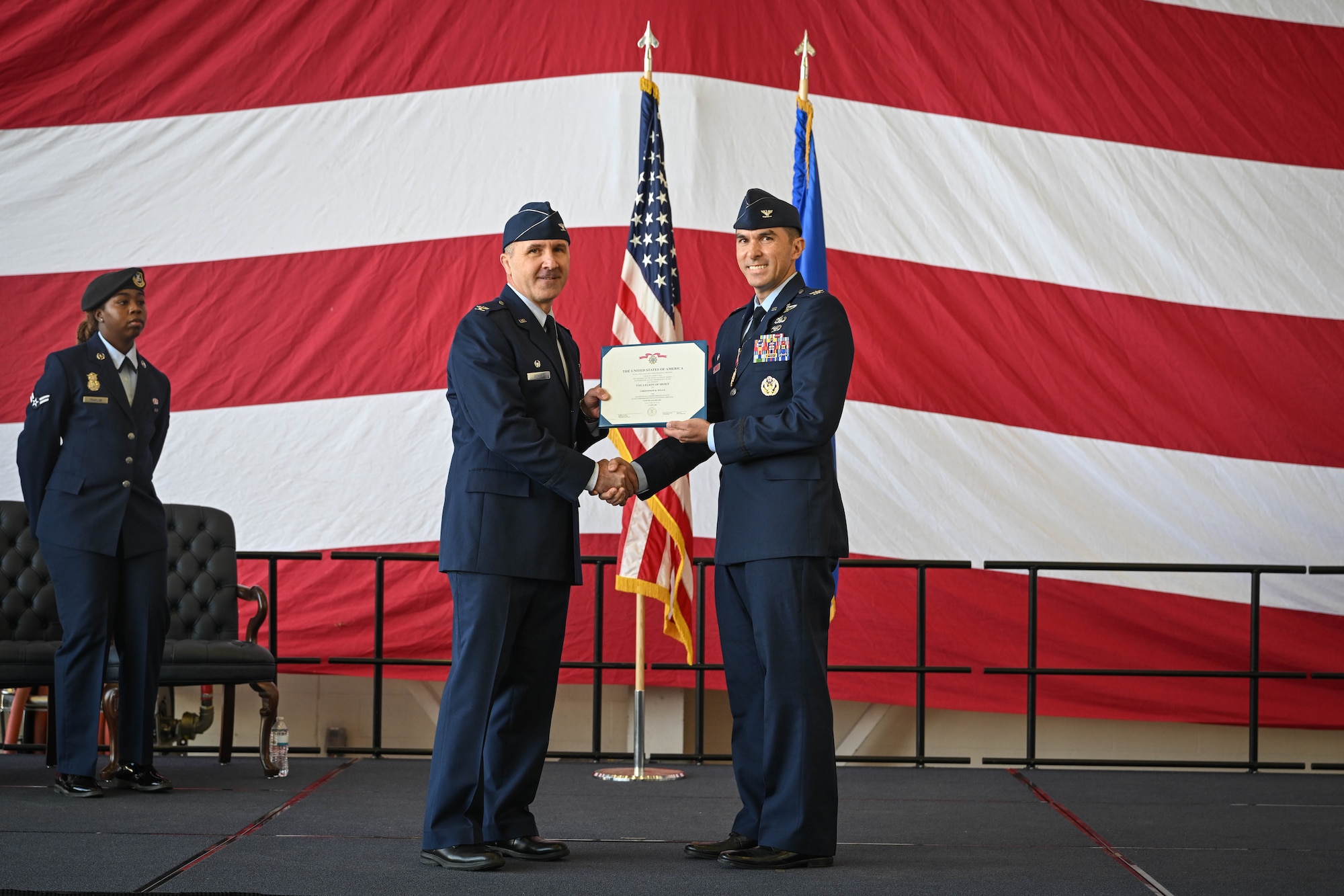 Airmen hold a certificate.