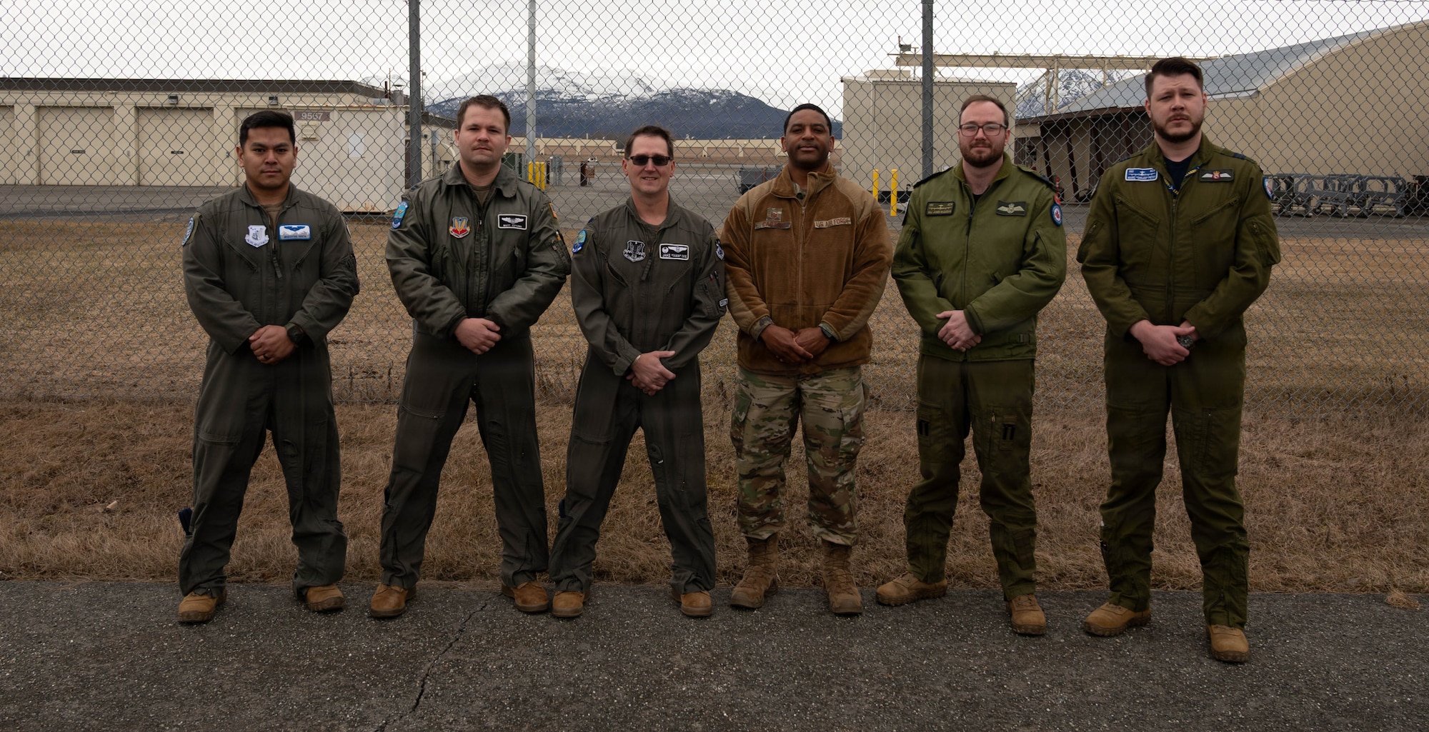U.S. Air Force leadership from the 960th Airborne Air Control Squadron poses for a photo with total force partners from the U.S. Air Force 961st AACS and Royal Canadian Air Force leadership from the 552nd Air Control Wing at the end of exercise Red Flag - Alaska 26-1 at Joint Base Elmendorf-Richardson, Alaska, May 1, 2026.