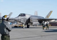 U.S. Marine Corps service members perform preflight checks on an F-35B Lightning II during RED FLAG-Alaska 26-1 at Eielson Air Force Base, Alaska, April 27, 2026.
