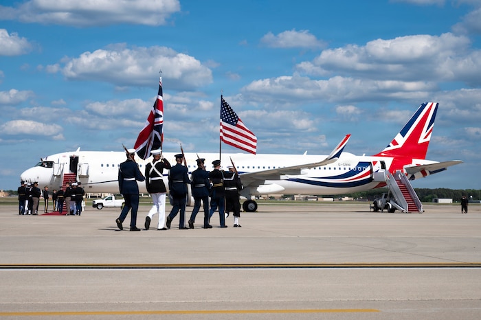 U.S. service members with an armed forces full honor cordon march to their positions next to a United Kingdom aircraft during a departure ceremony for His Majesty of the United Kingdom of Great Britain and Northern Ireland, King Charles III, at Joint Base Andrews, Maryland, April 30, 2026. The ceremony marked the conclusion of the first royal state visit to the United States following His Majesty’s ascension to the throne. (U.S. Air Force photo by Staff Sgt. Alex Broome)
