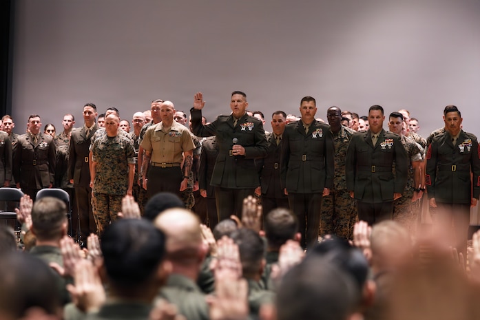U.S. Marine Corps Col. Robert G. McCarthy III, commanding officer, The Basic School, Training Command, center, delivers the oath of office to Marines with Company I, Warrant Officer Basic Course during an appointment ceremony at Marine Corps Base Quantico, Virginia, April 1, 2026. Enlisted Marines attend the WOBC at TBS to be trained and educated to perform the duties required of a warrant officer in their respective occupational fields. (U.S. Marine Corps photo by Cpl. Joshua Barker)