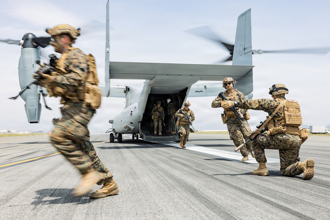 U.S. Marines with 1st Battalion, 25th Marine Regiment, 4th Marine Division, currently assigned to 3rd Marine Division under the Unit Deployment Program, conduct a Marine Air Ground Task Force demonstration during Family Day at Marine Corps Air Station Iwakuni, May 2, 2026. MCAS Iwakuni’s Family Day gave U.S. and Japanese community members, their families, local orphanages, and individuals with special needs an opportunity to experience a smaller-scale Friendship Day during the air show rehearsal, highlighting the enduring strength of the U.S.-Japan Alliance. (U.S. Marine Corps photo by Cpl. Sarah Grawcock)