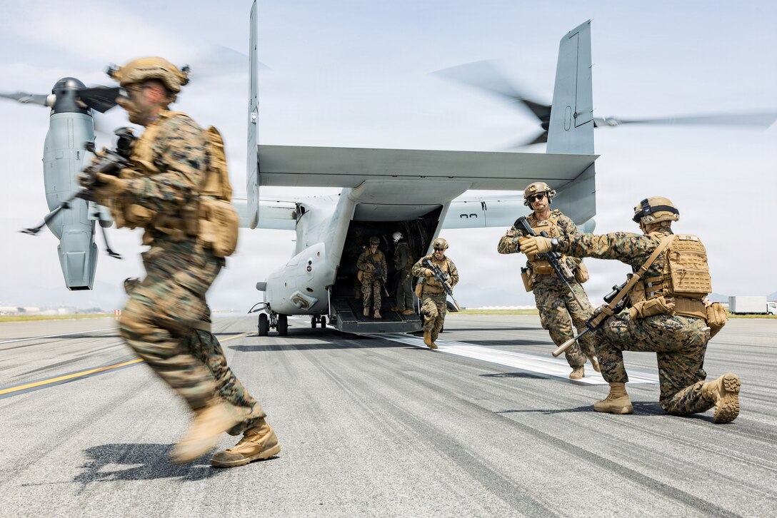 U.S. Marines with 1st Battalion, 25th Marine Regiment, 4th Marine Division, currently assigned to 3rd Marine Division under the Unit Deployment Program, conduct a Marine Air Ground Task Force demonstration during Family Day at Marine Corps Air Station Iwakuni, May 2, 2026. MCAS Iwakuni’s Family Day gave U.S. and Japanese community members, their families, local orphanages, and individuals with special needs an opportunity to experience a smaller-scale Friendship Day during the air show rehearsal, highlighting the enduring strength of the U.S.-Japan Alliance. (U.S. Marine Corps photo by Cpl. Sarah Grawcock)