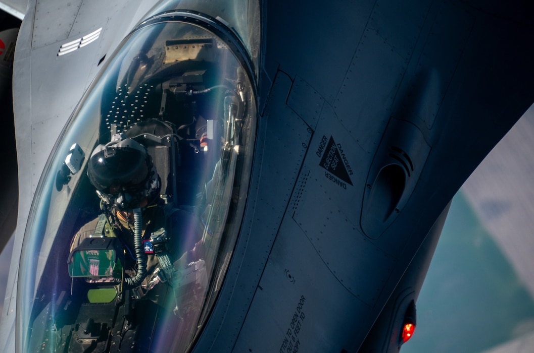 Iowa Air National Guard Airmen assigned to the 185th Air Refueling Wing refuel F-16 Fighting Falcons from the 114th Fighter Wing using a KC-135 Stratotanker during a training mission over the Midwest, May 1, 2026. Aerial refueling extends the range and endurance of military aircraft, enabling global mobility operations.
