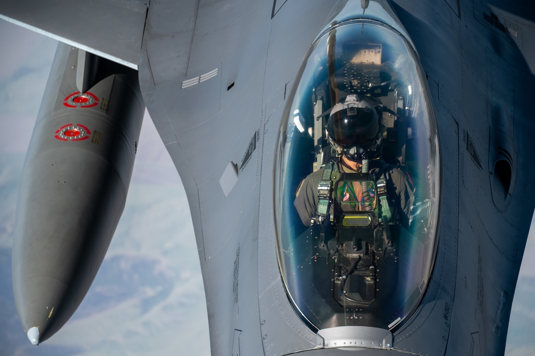 Iowa Air National Guard Airmen assigned to the 185th Air Refueling Wing refuel F-16 Fighting Falcons from the 114th Fighter Wing using a KC-135 Stratotanker during a training mission over the Midwest, May 1, 2026. Aerial refueling extends the range and endurance of military aircraft, enabling global mobility operations.