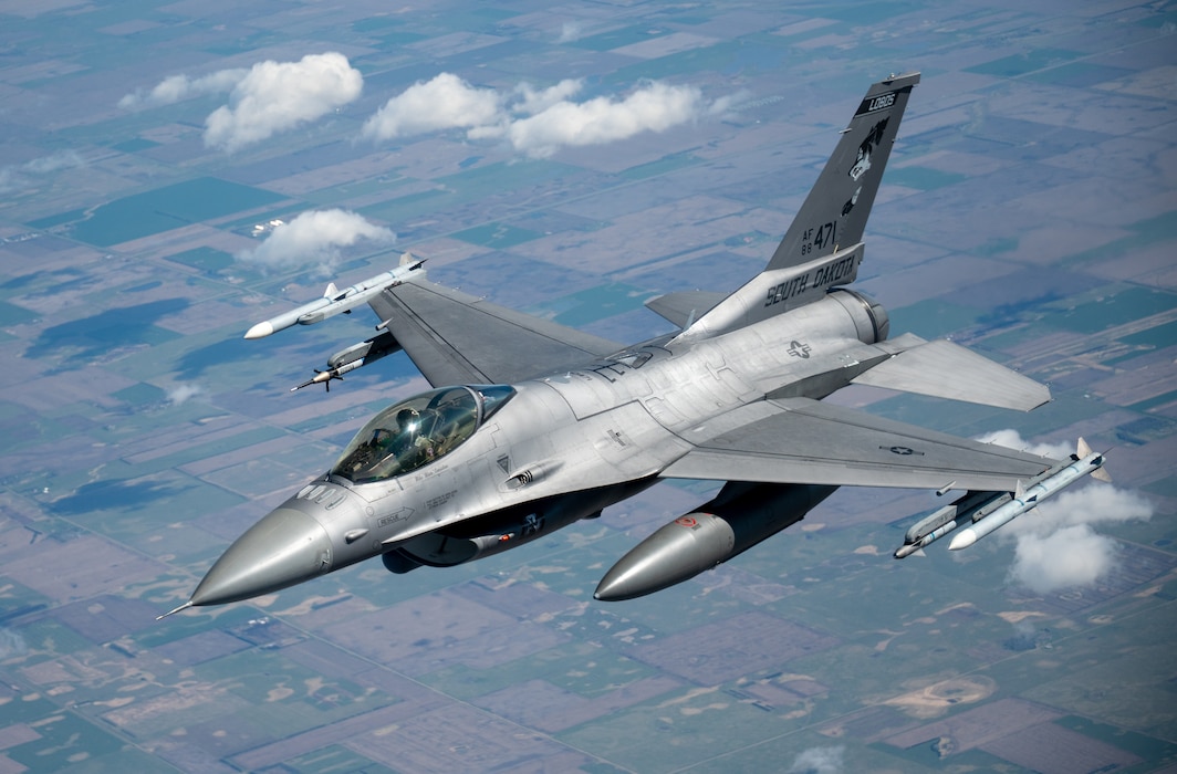 Iowa Air National Guard Airmen assigned to the 185th Air Refueling Wing refuel F-16 Fighting Falcons from the 114th Fighter Wing using a KC-135 Stratotanker during a training mission over the Midwest, May 1, 2026. Aerial refueling extends the range and endurance of military aircraft, enabling global mobility operations.