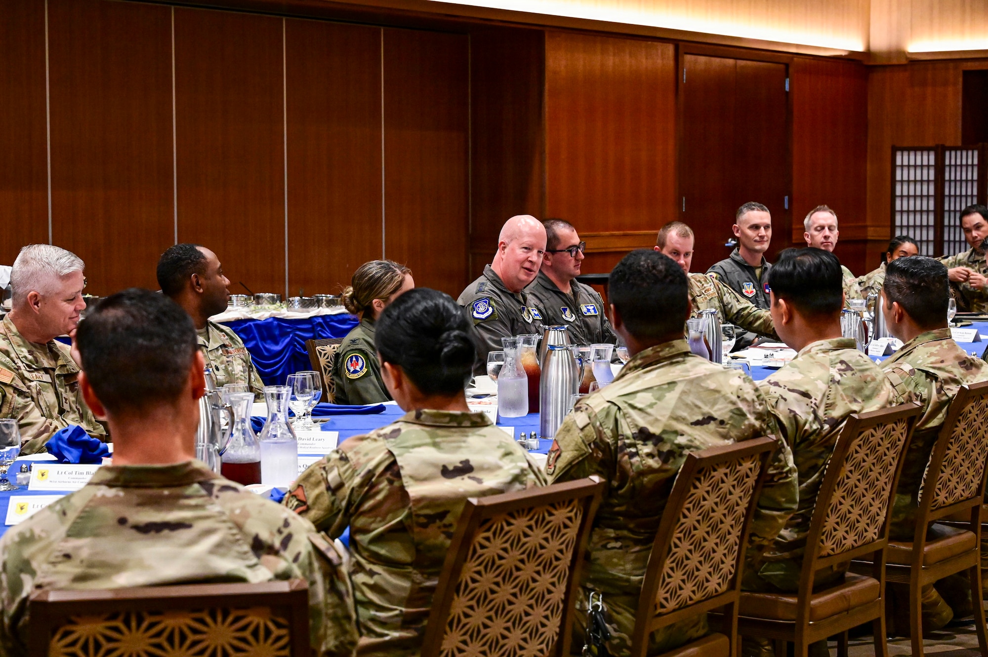 5th Air Force Commander talks with Squadron Leadership during a lunch