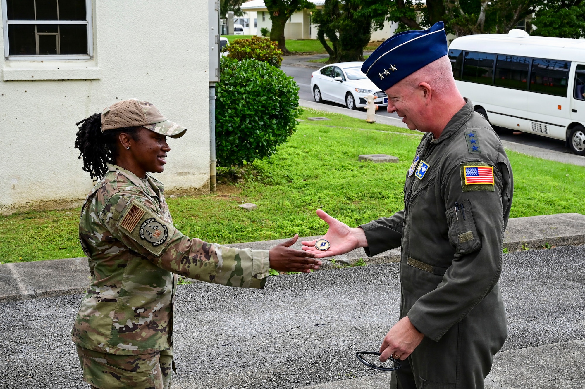 5th Air Force commander coining an Airman