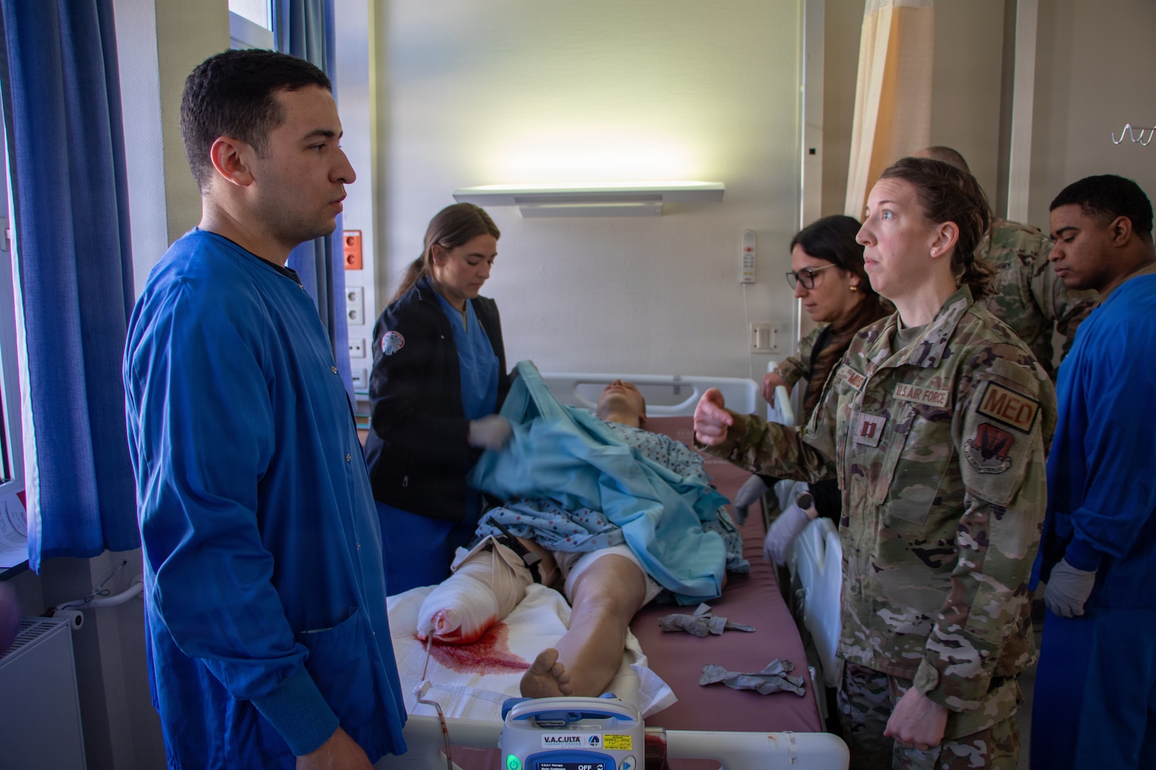 Clinical staff assigned to Landstuhl Regional Medical Center participate in Battlefield Injury Progressive Training led by the Center for Nursing Science and Clinical Inquiry in collaboration with the European Medical Simulation Center, April 2026, in Landstuhl, Germany.. More than 250 joint-service medical personnel completed a three-phase, high-fidelity training program using realistic patient scenarios to strengthen trauma care skills, critical thinking and team performance. The training reinforced medical readiness and prepares personnel to deliver high-quality care in support of the joint warfighter. (DoD Photo by Travis Jones)