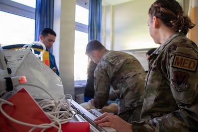 Clinical staff assigned to Landstuhl Regional Medical Center participate in Battlefield Injury Progressive Training led by the Center for Nursing Science and Clinical Inquiry in collaboration with the European Medical Simulation Center, April 2026, in Landstuhl, Germany.. More than 250 joint-service medical personnel completed a three-phase, high-fidelity training program using realistic patient scenarios to strengthen trauma care skills, critical thinking and team performance. The training reinforced medical readiness and prepares personnel to deliver high-quality care in support of the joint warfighter. (DoD Photo by Travis Jones)