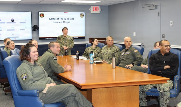 Capt. Kristin Hodapp, Deputy Chief of the Navy Medical Service Corps (MSC), engages with MSC officers and hospital corpsmen during a "State of the Medical Service Corps" question and answer session held at Naval Medical Readiness and Training Command (NMRTC) Patuxent River. The visit brought together MSC professionals from both the clinic and tenant commands across the installation, highlighting the unique concentration of administrative, clinical, and research expertise supporting the fleet
