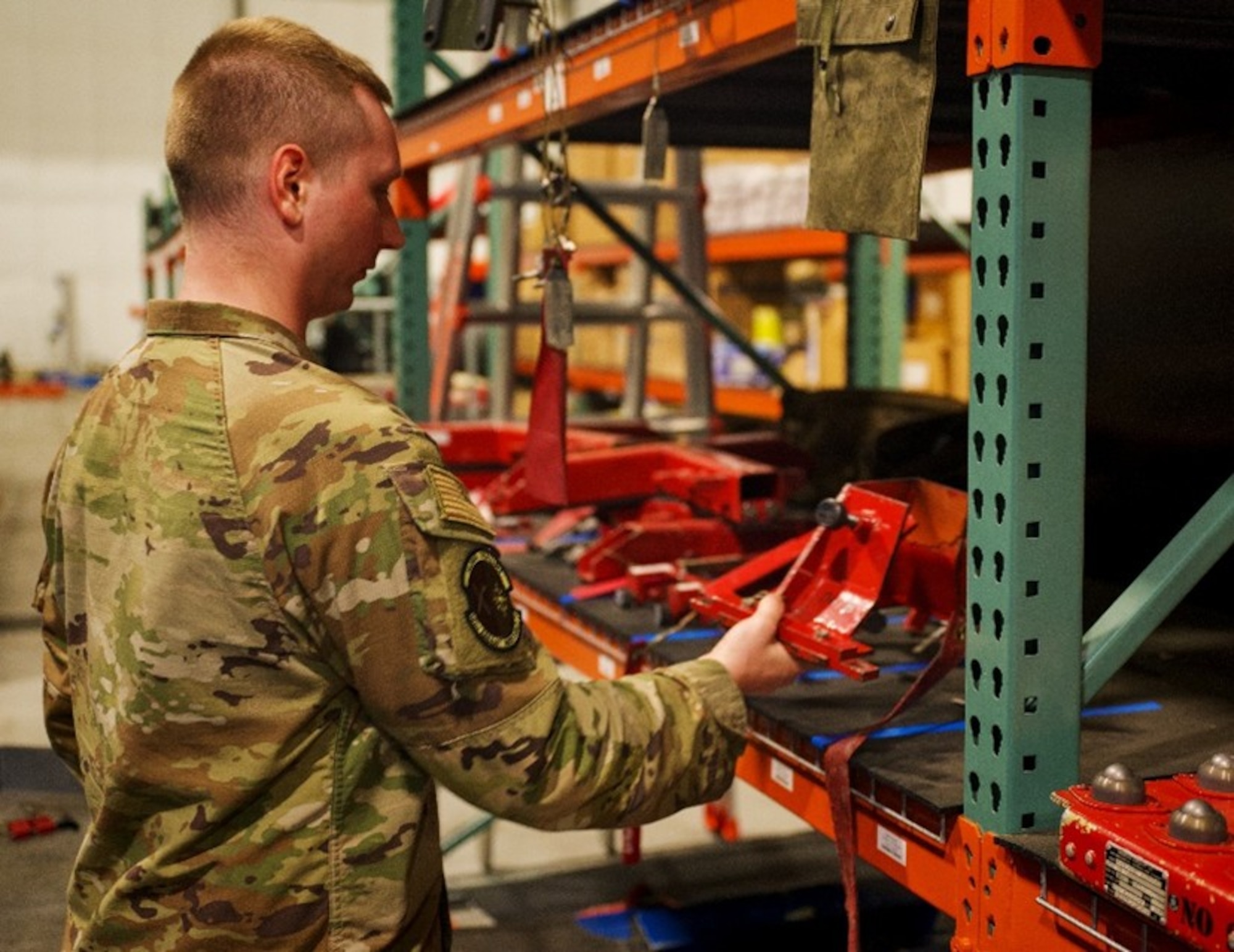 U.S. Air Force Senior Airman Andrew Marazoff, 305th Aircraft Maintenance Squadron C-17 Globemaster III aircraft support journeyman, stores flight control safety locks at Joint Base McGuire-Dix-Lakehurst, N.J., April 22, 2026. The 305th AMXS received the 2025 Air Mobility Command Maintenance Effectiveness Award in the Small Aircraft Maintenance Unit category, showcasing themselves as one of AMC’s most effective maintenance squadrons. (U.S. Air Force photo by 2nd Lt. Gabriel Davenport)