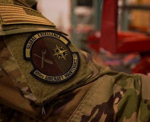 U.S. Air Force Senior Airman Andrew Marazoff, 305th Aircraft Maintenance Squadron C-17 Globemaster III aircraft support journeyman, stores flight control safety locks at Joint Base McGuire-Dix-Lakehurst, N.J., April 22, 2026. The 305th AMXS received the 2025 Air Mobility Command Maintenance Effectiveness Award in the Small Aircraft Maintenance Unit category, showcasing themselves as one of AMC’s most effective maintenance squadrons. (U.S. Air Force photo by 2nd Lt. Gabriel Davenport)