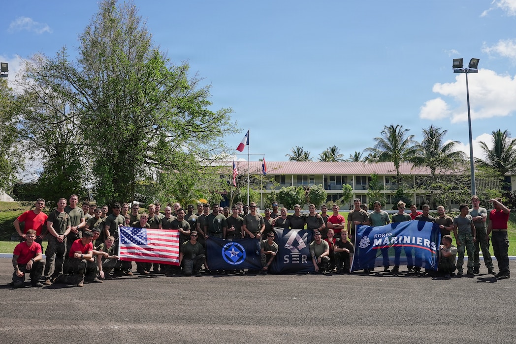 U.S. Marines with India Company, Battalion Landing Team 3/6, 22nd Marine Expeditionary Unit (Special Operations Capable), Dutch Marines, and French soldiers pose for a photo after an “Overlord” event as part of Tres Kolos 26 at Fort-De-France, Martinique, April 24, 2026. Participation in Tres Kolos 26 enhances interoperability with partner nations, reinforces longstanding security relationships, and improves combined readiness to respond to crises across the region. U.S. military forces are deployed to the Caribbean in support of U.S. Southern Command mission objectives and the president's priorities to strengthen regional security, disrupt illicit drug trafficking, and protect the homeland. (U.S. Marine Corps photo)