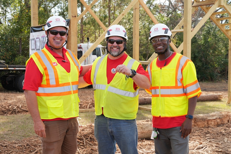 Dan Juracek (left), a safety specialist from U.S. Army Corps of Engineers (USACE), Fort Worth District recognized Chad Stellpflug (middle), a lock & dam operator from St. Paul District for making safety a priority while working as a quality assurance specialist at the Jenkins County temporary debris management site. Jovan Luna (right), a general engineer with Sacramento District, working as the zone manager submitted Stellpflug's name for recognition.