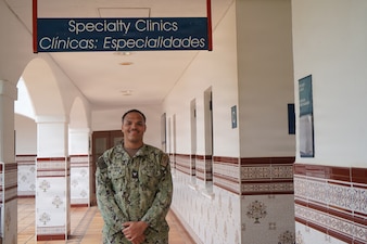 260215-N-FT324-6598. ROTA, Spain (February 15, 2026). Hospital Corpsman 3rd Class Joseph Barron, a native of Midland, Texas, assigned to Navy Medicine Readiness and Training Command Rota, serves as a physical therapy technician, working with active duty service members, their families and local nationals to rehabilitate patients back to functional ability in support of force health, readiness and mission success. (U.S. Navy photo by Lt. Cmdr. Alicia Sacks)