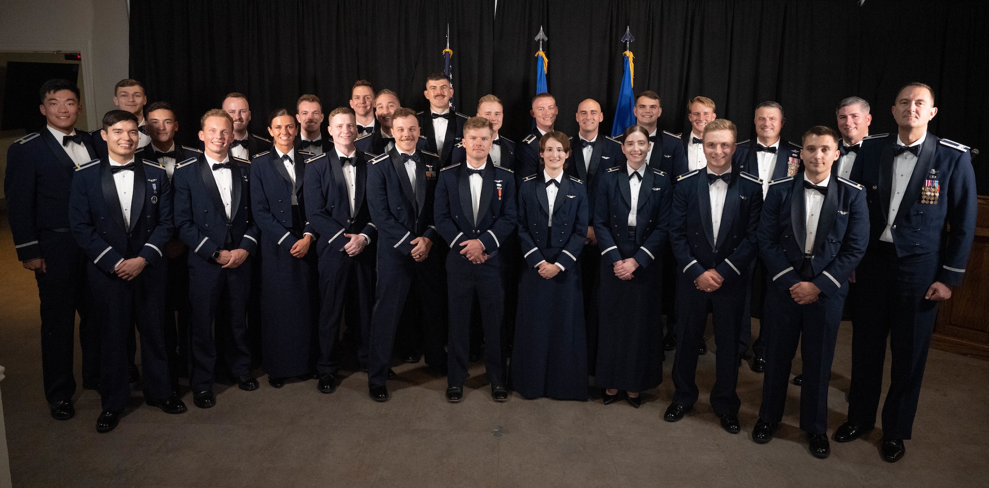 Student pilots from graduating Class 26-09 and leaders from the 47th Flying Training Wing come together for a group photo at Laughlin Air Force Base, Texas, April 30, 2026. Twenty-five U.S. Air Force officers were recognized for successfully completing Undergraduate Pilot Training during a graduation ceremony. (U.S. Air Force photo by Airman 1st Class Darryl Keith)