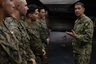 U.S. Navy Admiral Brad Cooper, Commander of U.S. Central Command, speaks with the America-class amphibious assault ship USS Tripoli (LHA 7) crew in the hangar bay during an awards quarters. Cooper interacted with Sailors and Marines and toured various spaces aboard the amphibious assault ship. Tripoli is deployed to the U.S. 5th Fleet area of operations to support maritime security and stability in the Middle East. (U.S. Navy photo by Senior Chief Mass Communication Specialist Amanda Dunford)