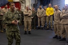 U.S. Navy Admiral Brad Cooper, commander of U.S. Central Command, speaks with the America-class amphibious assault ship USS Tripoli (LHA 7) crew in the hangar bay. Cooper interacted with Sailors and Marines and toured various spaces aboard the amphibious assault ship. Tripoli is deployed to the U.S. 5th Fleet area of operations to support maritime security and stability in the Middle East. (U.S. Navy photo by Senior Chief Mass Communication Specialist Amanda Dunford)