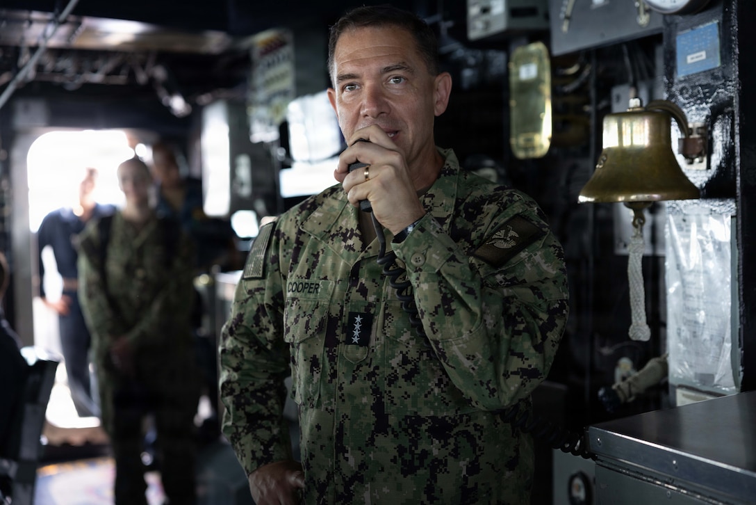 U.S. Navy Admiral Brad Cooper, commander of U.S. Central Command, speaks with the crew on the 1MC during a visit to Arleigh Burke-class guided-missile destroyer USS Milius (DDG 69). Cooper interacted with Sailors, recognized the ship's top performers and toured various spaces. Milius is deployed to the U.S. 5th Fleet area of operation to support maritime security and stability in the Middle East. (U.S. Navy photo by Senior Chief Mass Communication Specialist Amanda Dunford)