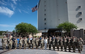 U.S. Space Force Gen. B. Chance Saltzman, Chief of Space Operations, poses for a photo with members of the 20th Space Surveillance Squadron at Eglin Air Force Base, Florida, April 13, 2026. The 20th SPSS executes multi-platform tactical space domain characterization and responsiveness to support Space Delta 2 and U.S. Space Command warfighting intent. (U.S. Air Force photo by 2nd Lt Hannah Lancaster)