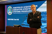 Vice Adm. Johnny Wolfe Jr., the director for Portfolio Acquisition Executive (PAE) Strategic Systems Programs (SSP), speaks to the workforce at a town hall event in Washington D.C. on April 27, 2026. Wolfe reflected on the command’s 70-year history, program accomplishments, and the valuable work PAE SSP employees have contributed to the Navy’s strategic deterrence mission. 



PAE SSP is responsible for sustaining the strategic weapon system on the Ohio-class ballistic missile submarines and supporting the integration of the D5LE weapon system on the new Columbia-class SSBNs. Looking to the future, SSP is actively modernizing the sea-based leg of the nuclear triad through the development of the D5LE2 SWS and pioneering regional strike capabilities of the future through development of the nuclear-armed sea launched cruise missile and the non-nuclear hypersonic conventional prompt strike system.