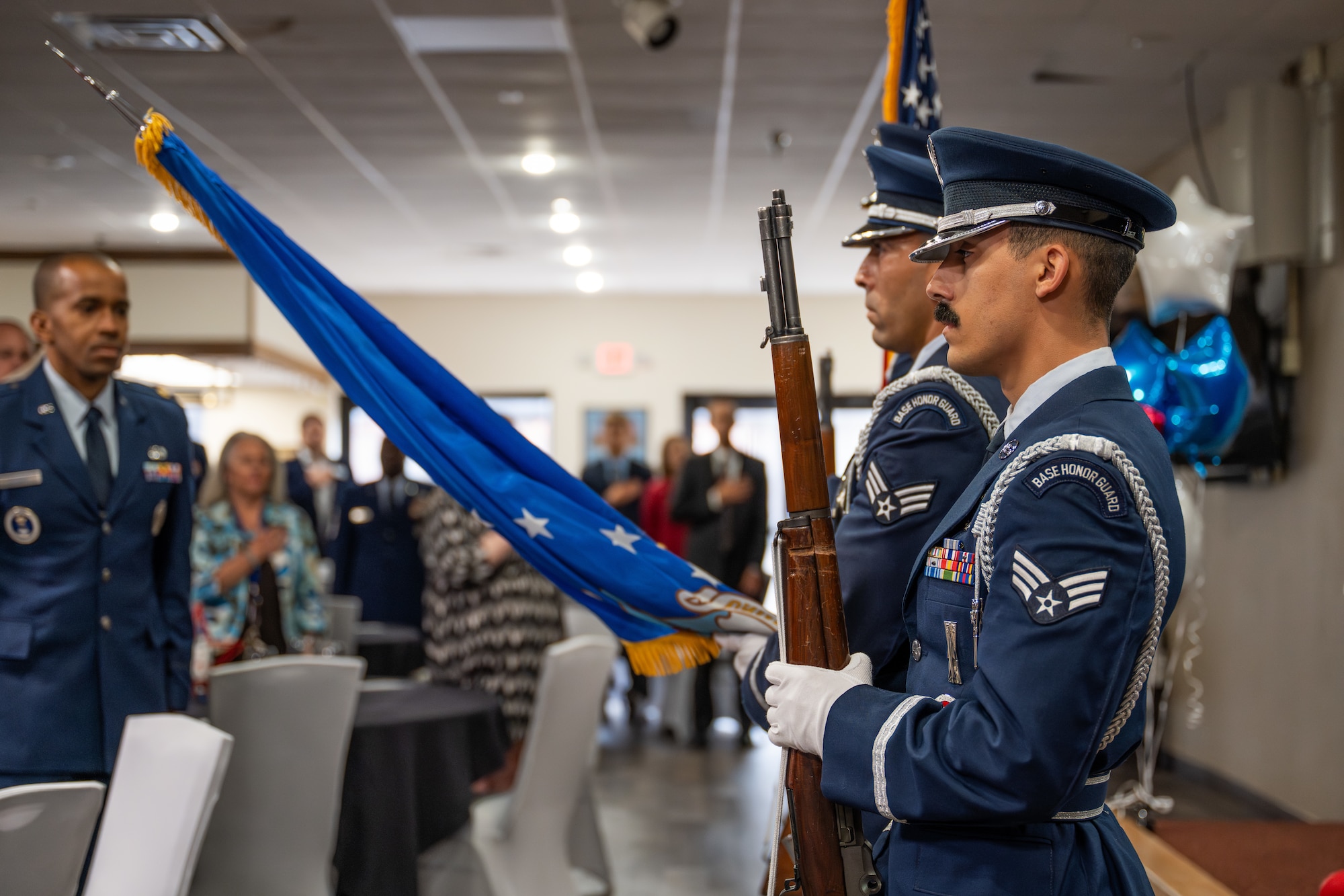 Members of the Dyess Air Force Base Honor Guard present the colors during a signing day event at Dyess Air Force Base, Texas, April 30, 2026. The ceremony formally recognized local students who have committed to serving their country in various branches of the U.S. Armed Forces. (U.S. Air Force Photo by Airman 1st Class Caleb Schellenberg)