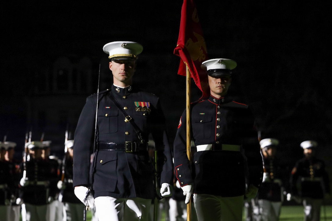 U.S. Marines with Alpha Company, Marine Barracks Washington, execute “pass in review” during an Evening Parade at Marine Barracks Washington, D.C., April 24, 2026. Guests witnessed moving musical performances, storied military formation, and the pageantry of one of the Marine Corps’ most celebrated traditions. Evening Parades at 8th & I highlight the Marine Corps’ precision, discipline, and heritage for guests from across the nation. (U.S. Marine Corps photo by Pfc. Landon Heredia)