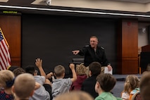 Vice Adm. Johnny Wolfe Jr., the director for Portfolio Acquisition (PAE) Executive Strategic Systems Programs (SSP), answers questions from children of the workforce at PAE SSP’s Bring Your Child to Work Day on April 23, 2026. PAE SSP welcomed more than 275 children to the command’s headquarters in Washington D.C., to learn about their parents’ day-to-day job supporting the U.S. Navy’s strategic deterrence mission.